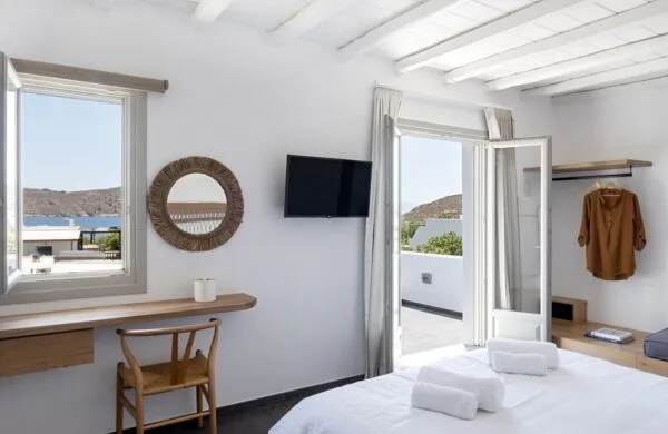 Deluxe Suite room space and sea view from balcony
